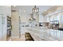 Bright kitchen with granite countertops, stainless steel appliances, and a subway tile backsplash at 9403 9Th Nw Ave, Bradenton, FL 34209