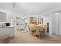 The open dining area and kitchen allows for seamless entertaining at 915 Beach Rd # 321, Sarasota, FL 34242