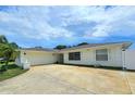 Well-maintained home featuring a two-car garage and a spacious driveway at 2004 40Th W St, Bradenton, FL 34205
