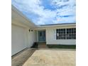 A close up image of the front door and garage at 2004 40Th W St, Bradenton, FL 34205