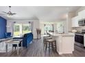 Modern kitchen with stainless steel appliances and island at 4535 Luther Ave, North Port, FL 34288
