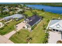 Aerial view of waterfront homes showcasing community layout at 2073 Treasure Ln, Punta Gorda, FL 33982