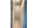 Walk-in pantry with wire shelving at 2563 Longworthy Rd, North Port, FL 34288