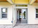 Modern front entry with double doors and access to interior at 28944 Gin Ln, Punta Gorda, FL 33982