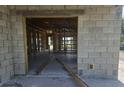 Interior view of a house under construction, showing framing and unfinished walls at 2297 Longworthy Rd, North Port, FL 34288