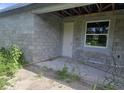 Unfinished home exterior with block walls at 2297 Longworthy Rd, North Port, FL 34288