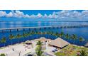 Beachfront property with volleyball court and tiki bar at 207 Shreve St, Punta Gorda, FL 33950