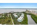 Aerial view of waterfront condo community near bridge at 5127 Melbourne St # F-204, Port Charlotte, FL 33980