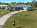Single Gathering home with carport and yard at 3341 Rock Creek Dr, Port Charlotte, FL 33948