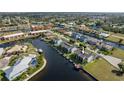 Aerial view of waterfront condo with boat slip at 1439 Mediterranean Dr # C, Punta Gorda, FL 33950