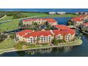 Exclusive waterfront condos with lush landscaping and golf course views at 98 Vivante Blvd # 98412, Punta Gorda, FL 33950