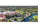 Luxury condos near a lake with resort amenities and beautiful landscaping at 98 Vivante Blvd # 98412, Punta Gorda, FL 33950