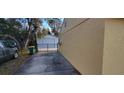 Side view of house showing driveway and detached garage at 21427 Michigan Ave, Port Charlotte, FL 33952