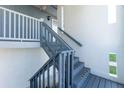 Staircase leading to the condo unit at 22375 Edgewater Dr # 239, Port Charlotte, FL 33980