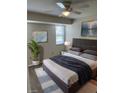 Spacious bedroom with virtually staged furniture and large windows at 3303 Ithaca St, Port Charlotte, FL 33952