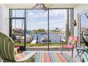 Relaxing screened porch overlooking the water at 3600 Bal Harbor Blvd # 1G, Punta Gorda, FL 33950