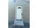 Back exterior of a newly renovated home showing its entrance at 612 Milus St, Punta Gorda, FL 33950
