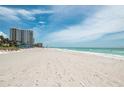 Beachfront view with white sand and ocean at 2675 Gulf Of Mexico Dr # 204, Longboat Key, FL 34228