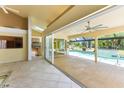 Bright living room with sliding doors leading to the pool area at 16681 Acapulco Rd, Punta Gorda, FL 33955