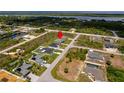 Aerial view showcasing the home's location in a residential neighborhood at 15512 Greenwood Ave, Port Charlotte, FL 33981