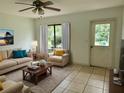 Bright living room with comfortable seating at 1160 Belkton Ave, Port Charlotte, FL 33948