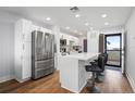 Modern kitchen with stainless steel appliances and white cabinets at 1500 Park Beach Cir # 3C, Punta Gorda, FL 33950