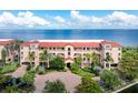 Aerial view of waterfront condo building entrance at 85 Vivante Blvd # 8534, Punta Gorda, FL 33950