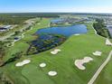 Golf course community with lake and homes at 14121 Heritage Landing Blvd # 731, Punta Gorda, FL 33955