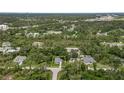 Aerial view showing a single-Gathering home in a residential area at 265 Tipton St, Port Charlotte, FL 33954