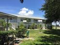 Condo building with two units and private balconies at 26470 Rampart Blvd # 123, Punta Gorda, FL 33983