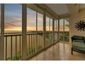 Bright sunroom with panoramic water views, perfect for relaxation at 200 Harbor Walk Dr # 352, Punta Gorda, FL 33950