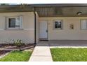 Condo building exterior showcasing entrance and landscaping at 25275 Rampart Blvd # 1801, Punta Gorda, FL 33983