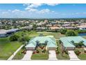 Aerial view of home near golf course with attractive landscaping at 1519 Atares Dr # 112, Punta Gorda, FL 33950