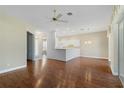 Bright and spacious living room with hardwood floors and kitchen at 1519 Atares Dr # 112, Punta Gorda, FL 33950