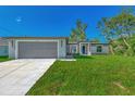 New construction home with attached garage at 3847 E Price Blvd, North Port, FL 34288