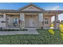 Front view of a single story home with a covered porch and landscaped yard at 17314 Cape Horn Blvd, Punta Gorda, FL 33955