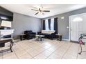 Living room with fireplace and comfortable seating at 5104 Chaves Cir, Port Charlotte, FL 33948