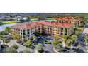 Aerial view of community with parking and waterfront access at 96 Vivante Blvd # 96211, Punta Gorda, FL 33950