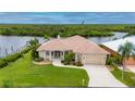 Single-Gathering home with tile roof and canal views at 5480 Sea Edge Dr, Punta Gorda, FL 33950
