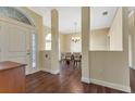 Elegant dining room with hardwood floors and a chandelier at 1639 Nuremberg Blvd, Punta Gorda, FL 33983