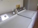 View of laundry room with washer and dryer included at 5787 Holiday Park Blvd, North Port, FL 34287