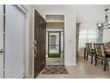 Inviting entryway with a view into the dining area at 7457 W Lenox Cir, Punta Gorda, FL 33950