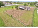 Single Gathering home with large backyard and canal in the background at 2673 Greendale Rd, North Port, FL 34287