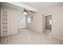 Simple dining room with tiled floors and built-in shelving at 3372 Lucerne Ter, Port Charlotte, FL 33952