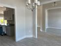 Bright dining area with tile floors and access to kitchen at 10045 Bay State Dr, Port Charlotte, FL 33981