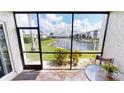 Screened porch overlooking the canal and boats at 3600 Bal Harbor Blvd # 1-O, Punta Gorda, FL 33950