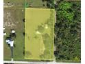 Aerial view of property showing house and surrounding land at 31840 Washington Loop Rd, Punta Gorda, FL 33982