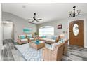 Bright and airy living room featuring stylish furnishings and neutral decor at 3159 Draper Ter, North Port, FL 34286