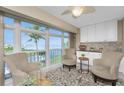 Bright dining area with water views and comfy seating at 1250 W Marion Ave # 242, Punta Gorda, FL 33950