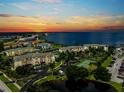 Luxury condo complex near the waterfront at sunset at 1250 W Marion Ave # 242, Punta Gorda, FL 33950